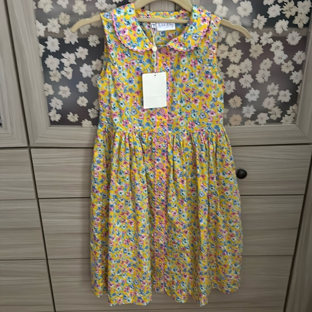 Rachel Riley size 10 cotton dress. Never worn, new with tags. Pink buttons.